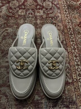 Chanel Quilted Leather Slide Mules in Light Gray with Gold CC